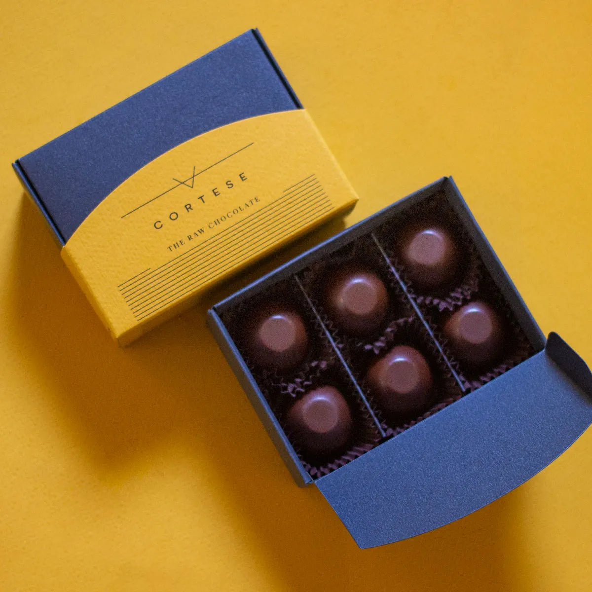 Pralina Fondente Ripieno Nocciola E Riduzione Al Caffè